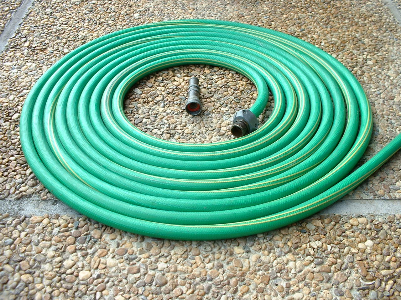 A hose connection usually seals at a washer, not by brute-force tightening.